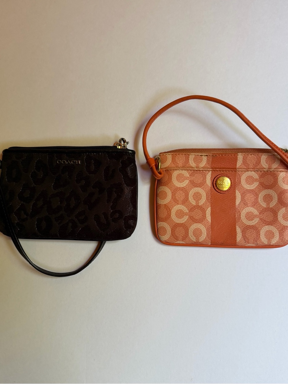 Set of Coach Wristlets in Black and Orange